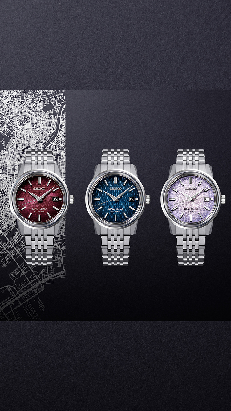King Seiko KSK series trio featuring the SJE103 red dial, SJE105 blue dial, and SJE107 dial models on a Tokyo map backdrop