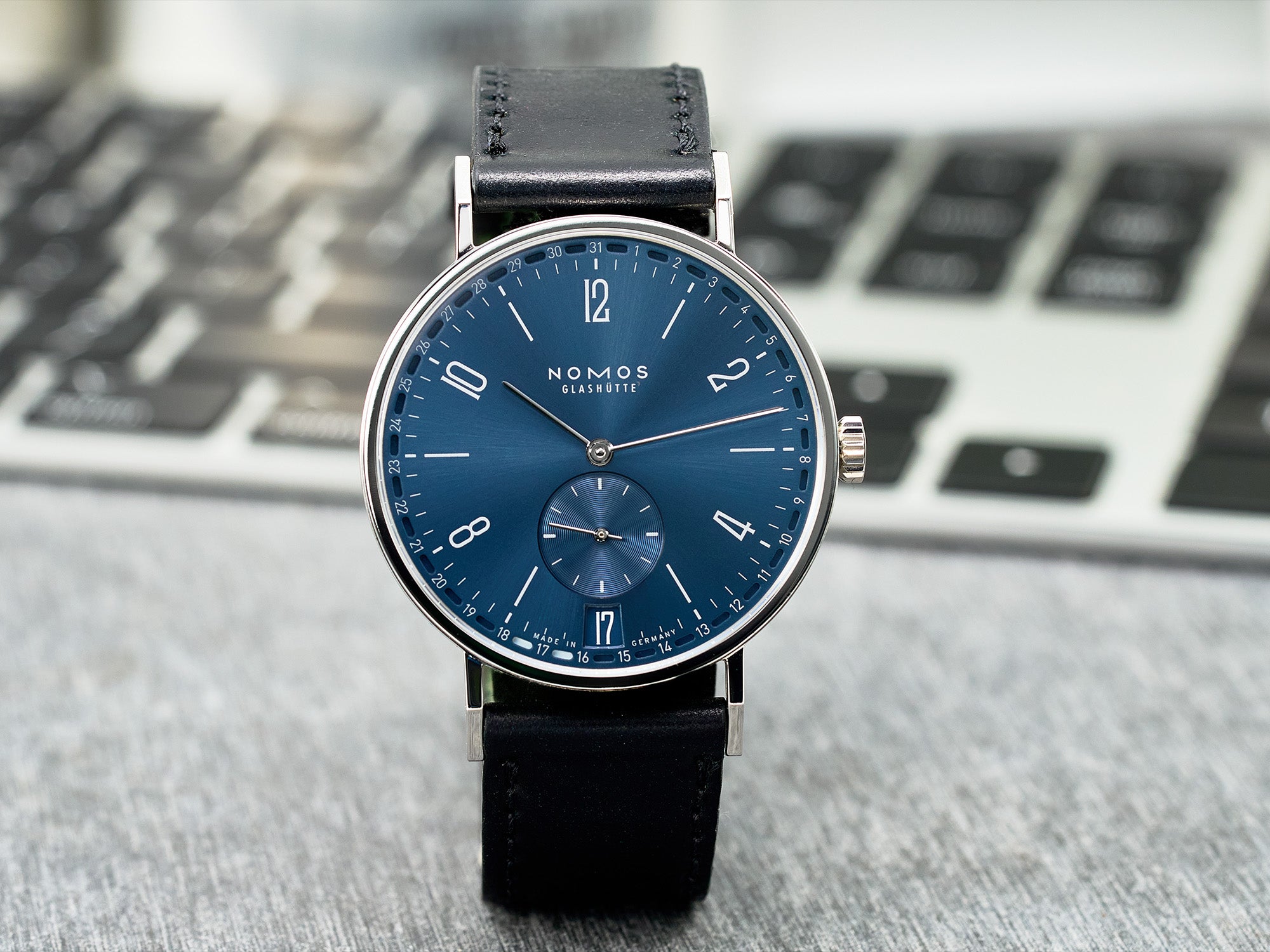 Nomos Tangente with white dial and blue hands